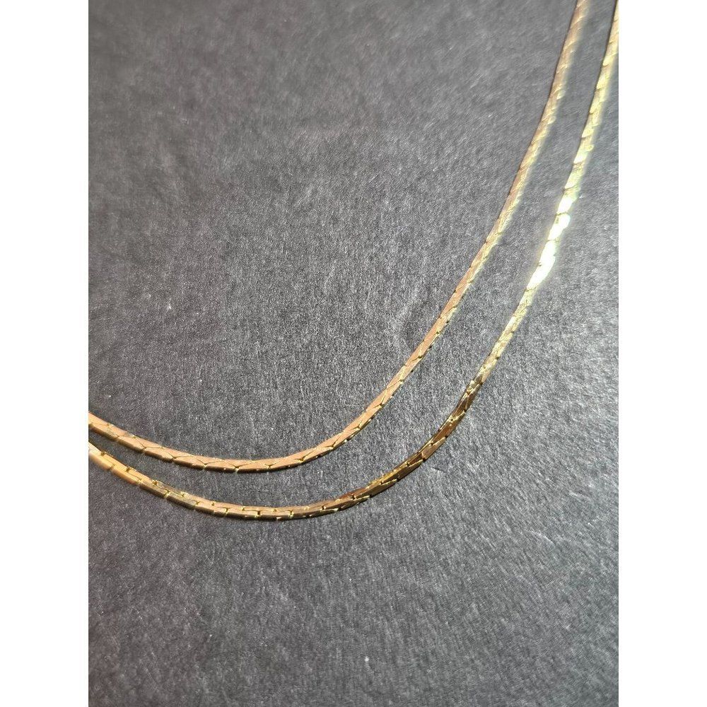 Gold tone adjustable necklace 14-24